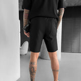 LOOSE FIT TEXTURED SEAM SHORTS - BLACK