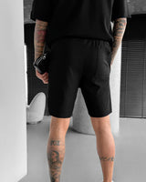 LOOSE FIT TEXTURED SEAM SHORTS - BLACK