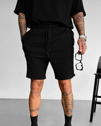 BLACK RELAXED FIT COTTON CRUSH SHORTS