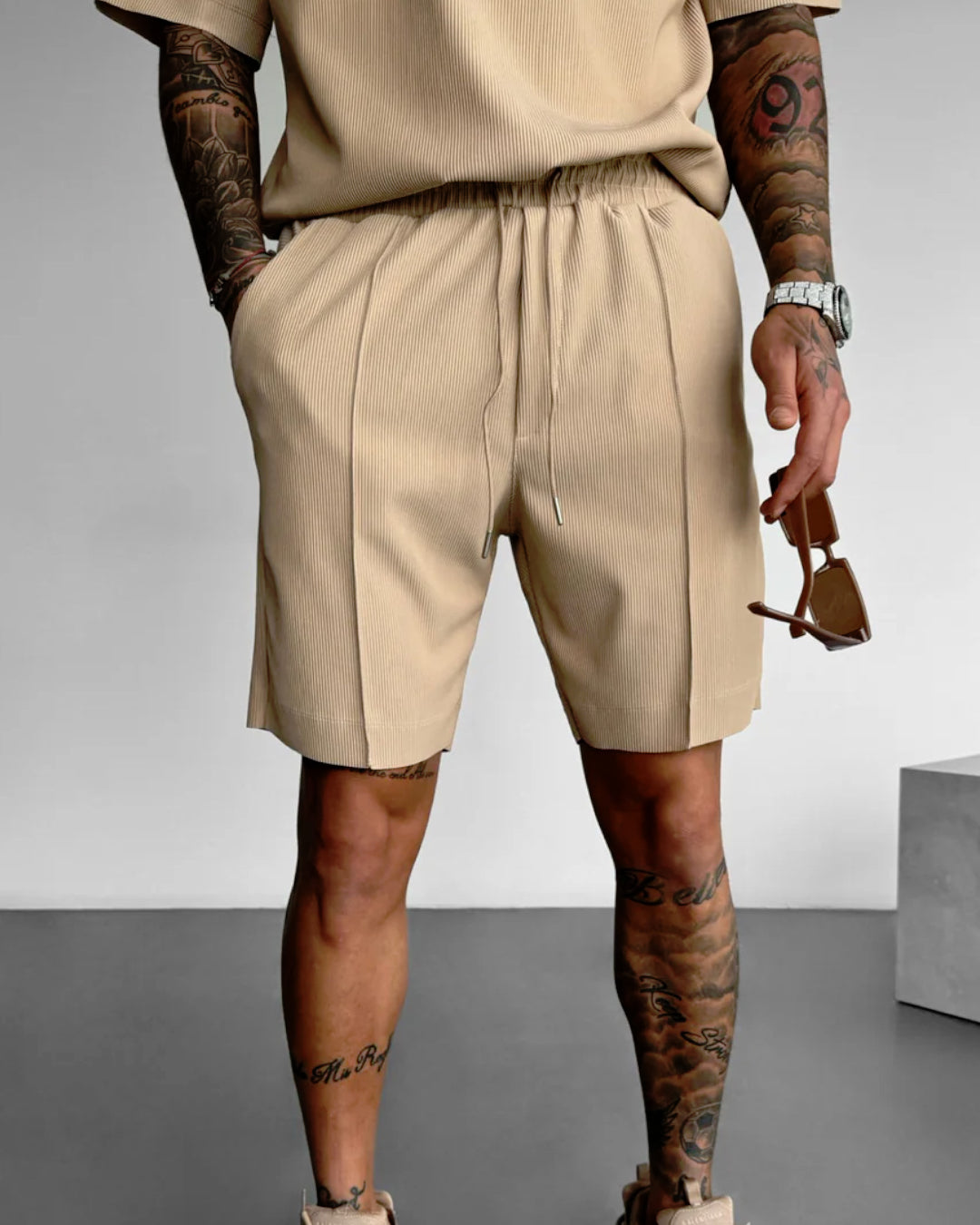 LOOSE FIT TEXTURED SEAM SHORTS - TAN