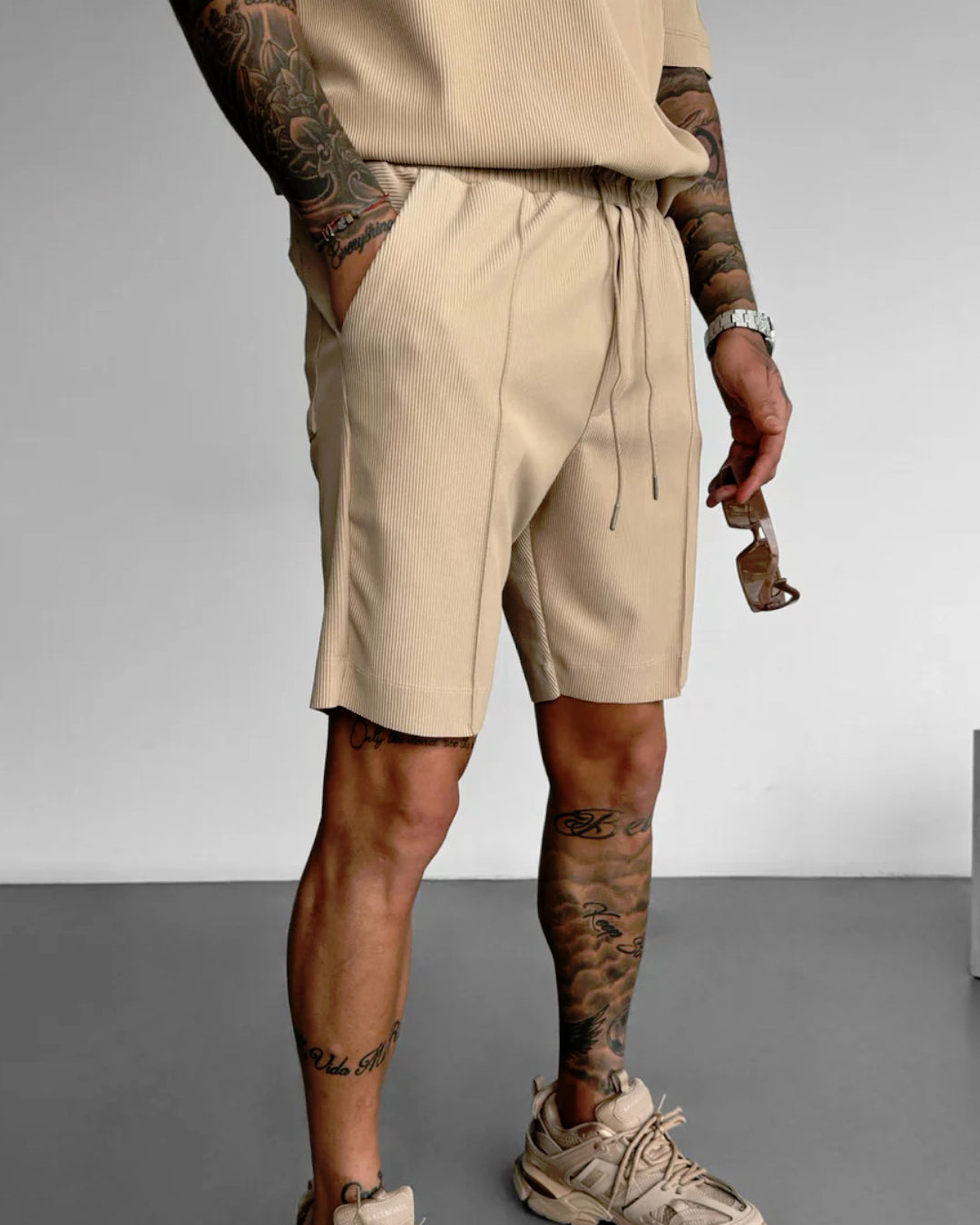 LOOSE FIT TEXTURED SEAM SHORTS - TAN