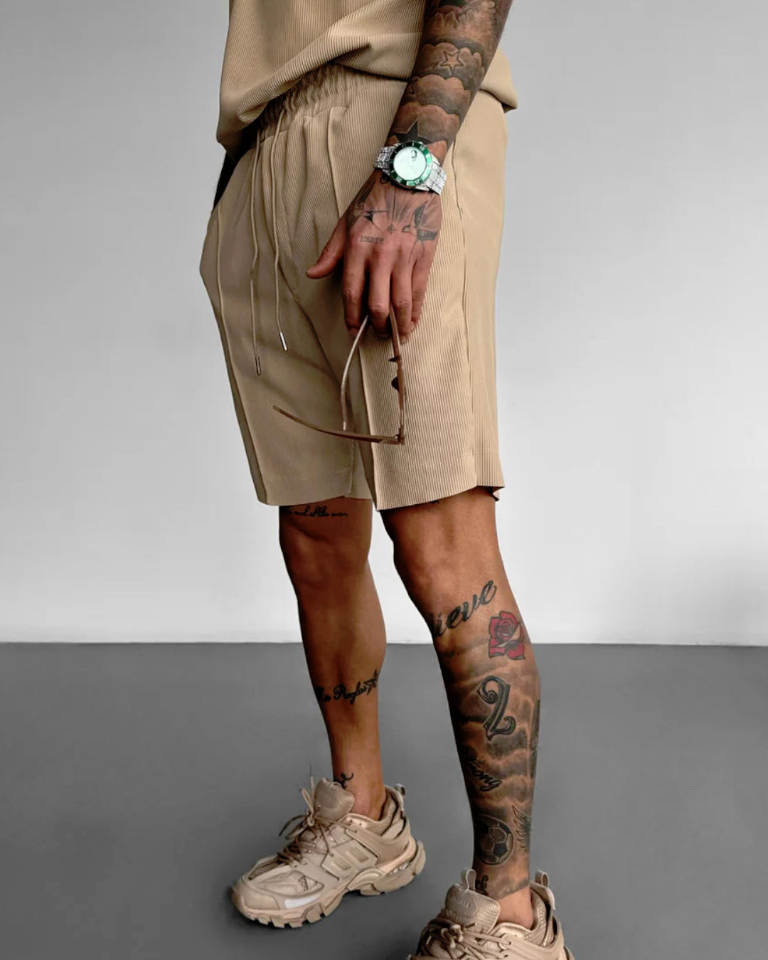LOOSE FIT TEXTURED SEAM SHORTS - TAN