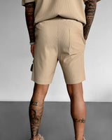 LOOSE FIT TEXTURED SEAM SHORTS - TAN